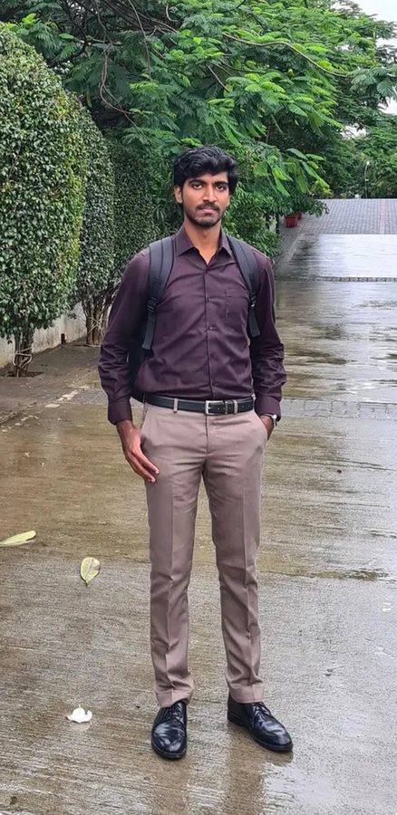 Standing outdoors with a backpack on a wet path